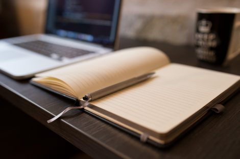 copywriting-book-pen-laptop